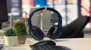 a headphone on a desk in a modern office workspace