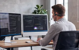 a man is looking at the question of bone conduction vs open ear headphones