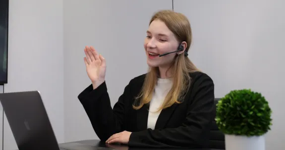 a business woman is talking about her hybrid workplace strategy