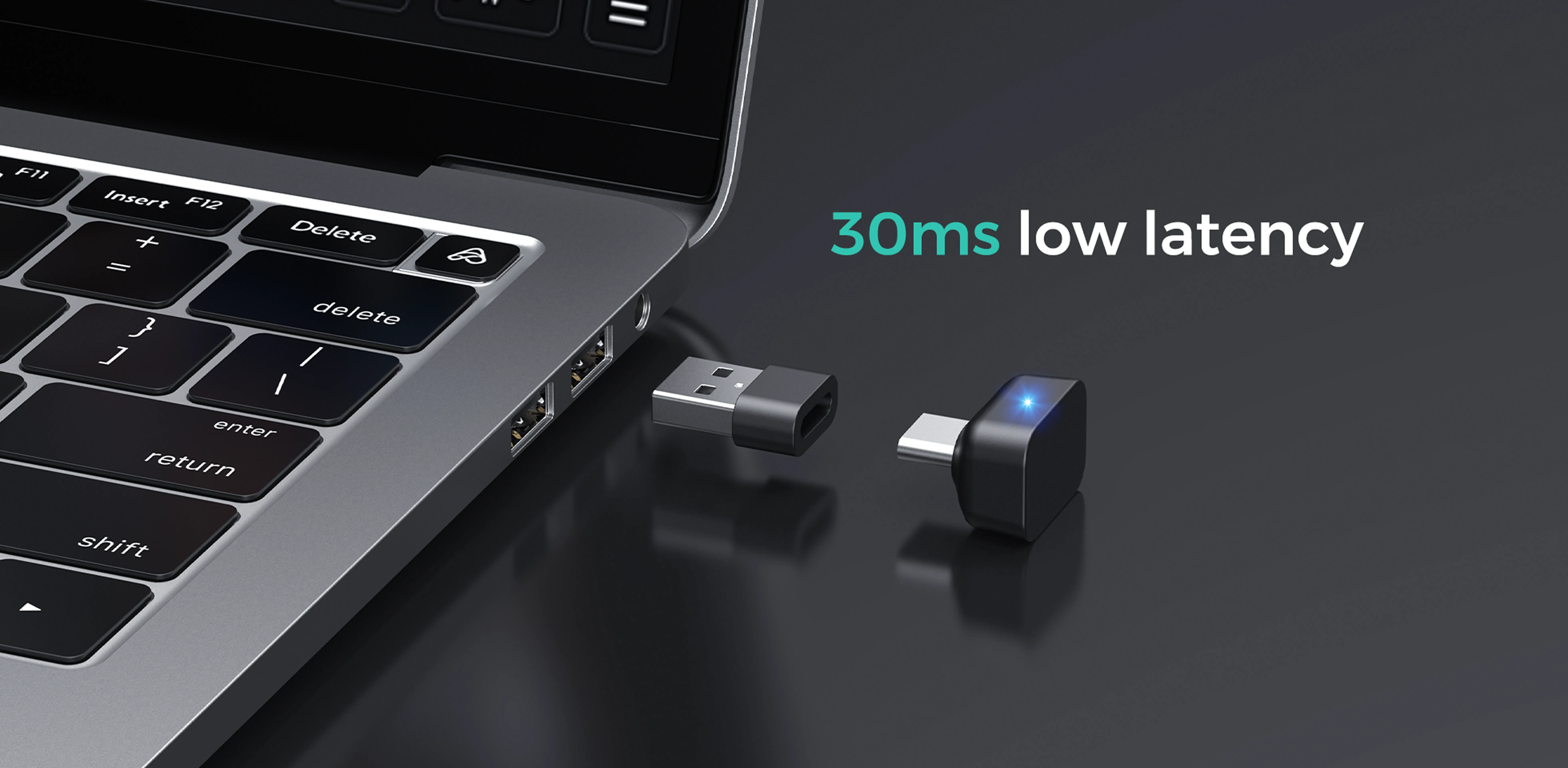 Low-latency USB dongle plugged into a laptop for an open-ear bluetooth headset for work and office communications.