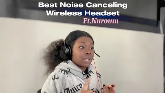 A woman wearing a wired headset with a microphone, featured in a video review for the best noise canceling wireless headset by Nuroum.
