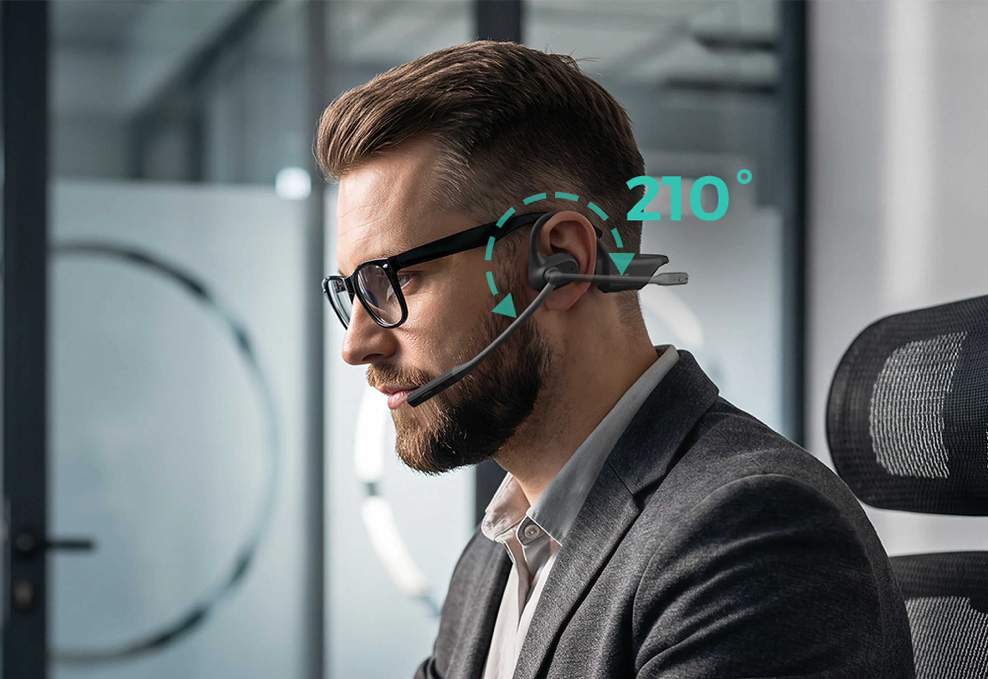 Businessman wearing an open-ear headset with glasses, showing the 210-degree rotatable noise-cancelling boom microphone.