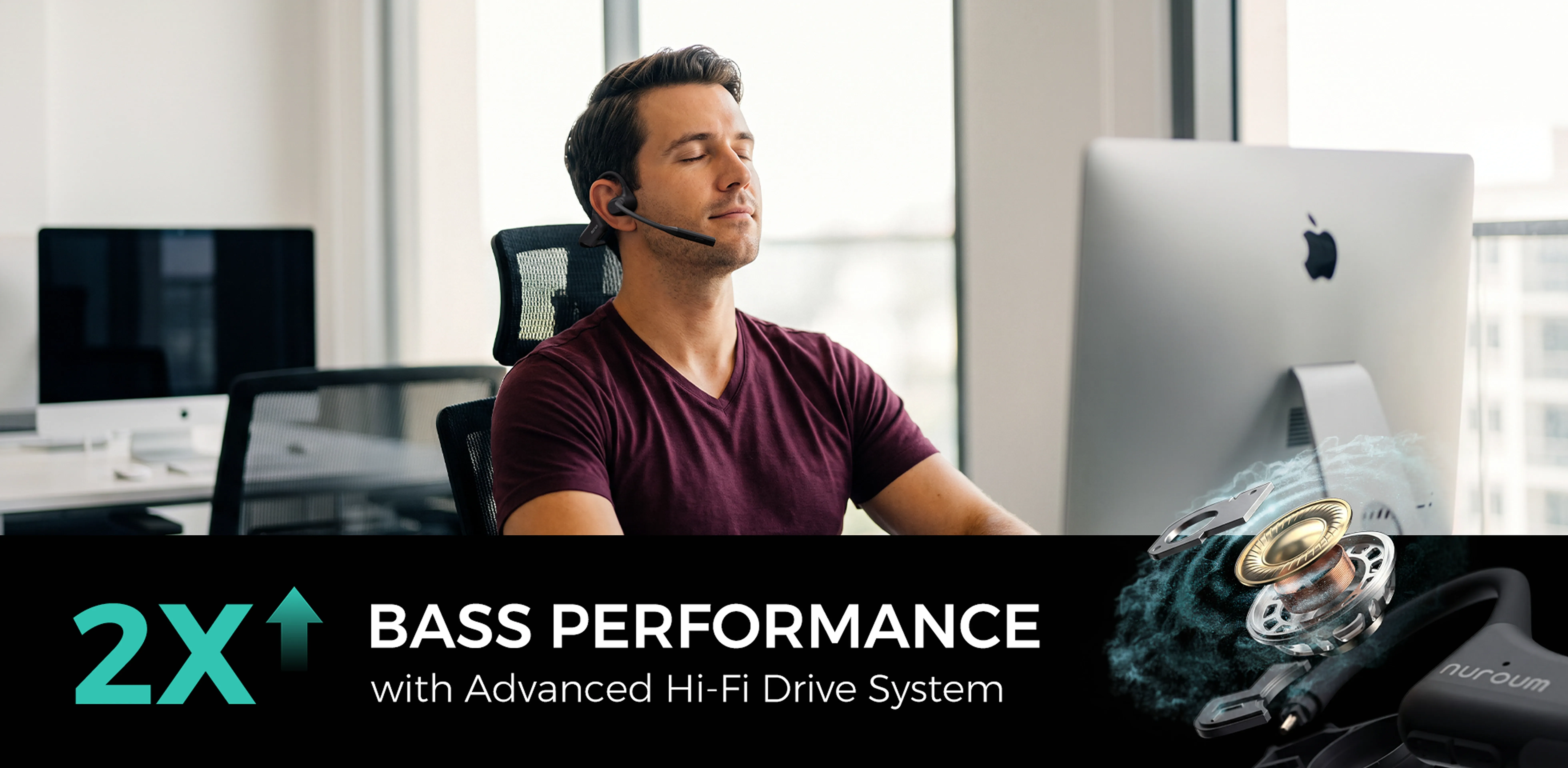 A professional enjoying music at work with the Nuroum open-ear bluetooth headset, powered by an advanced Hi-Fi drive system for enhanced bass.