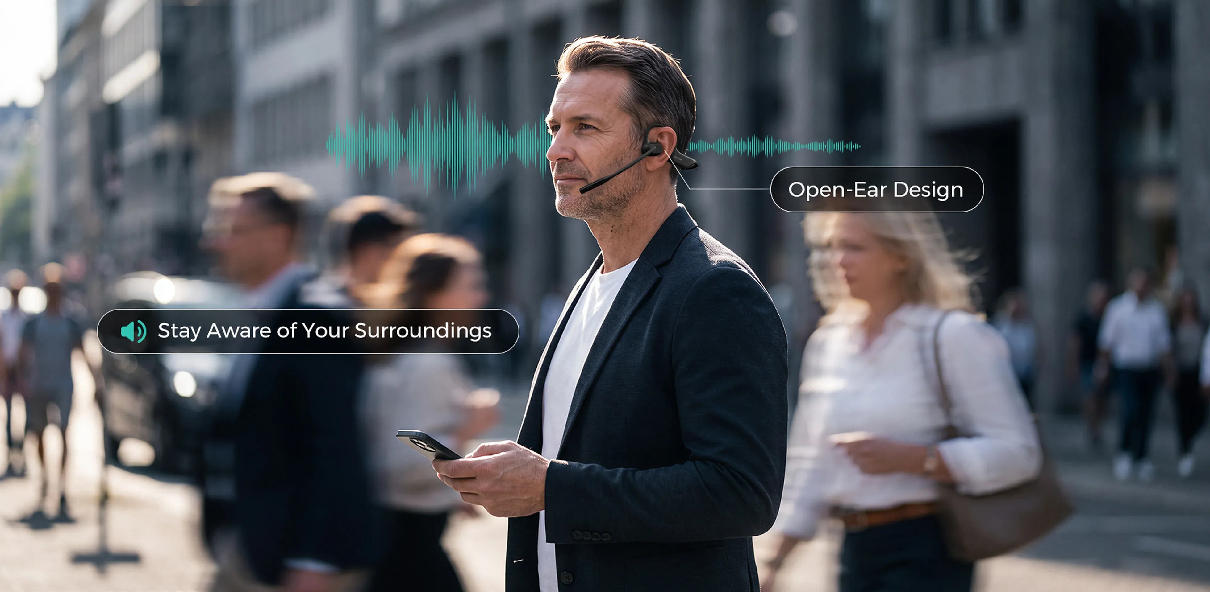 A man walking and using a phone on a busy city street while wearing a Nuroum open-ear headset with mic, showing situational awareness and open-ear safety without blocking surroundings.