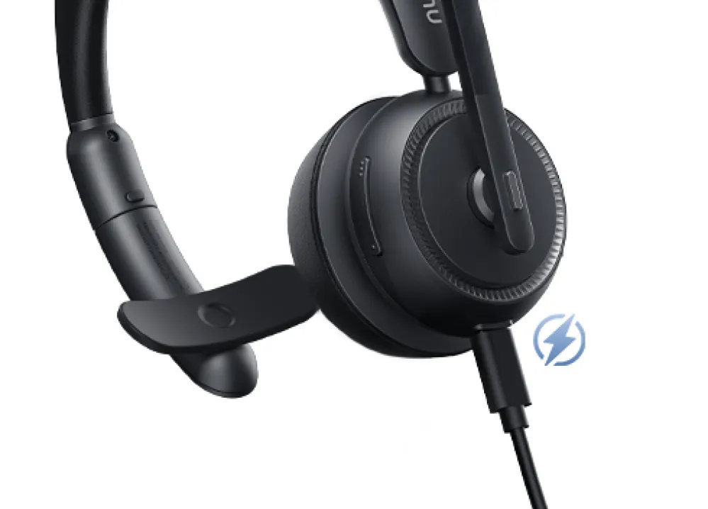 Single ear wireless headset with mic for PC supporting flexible USB-C wired charging for continuous workflow.